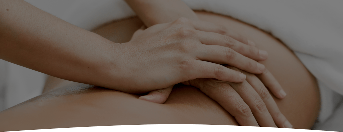 osteopathic massage banner. close up hands massaging patient