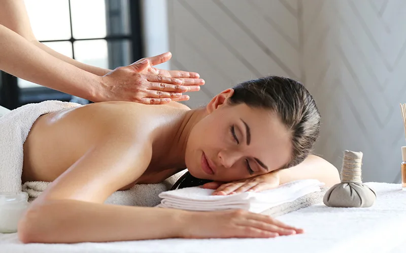 A woman gets a massage by a massage therapist 